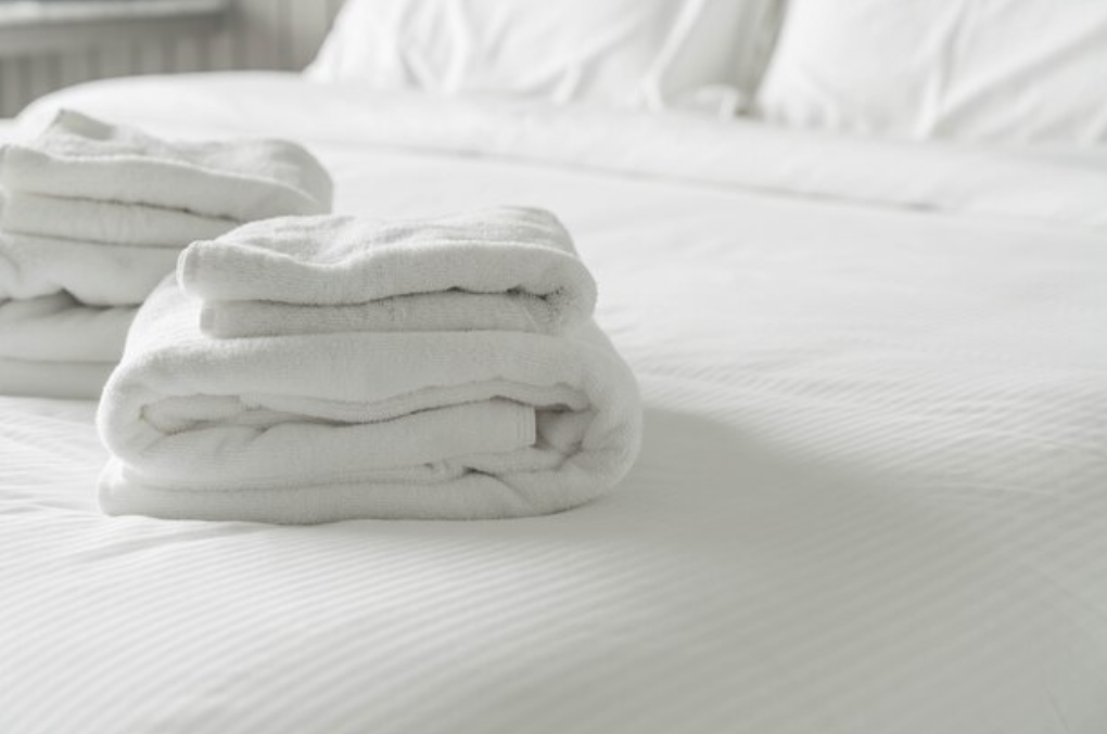 hotel white beds and sheets