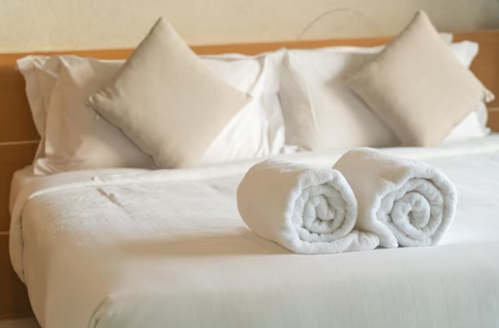 Why do hotels use white bed sheets and clothes? 