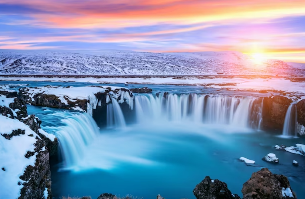 Iceland sunset, waterfall in winter, beautiful places
